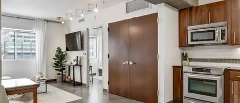 Fridge, microwave, cookware/dishes/utensils