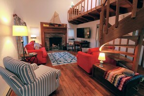 Una Smart TV, una chimenea