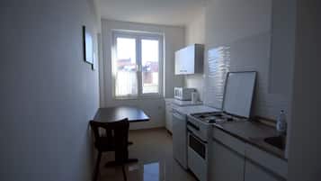 Business-Apartment | Eigene Küche | Kühlschrank, Mikrowelle, Ofen, Herdplatte