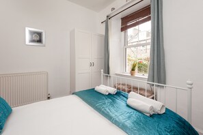 2 bedrooms, laptop workspace, iron/ironing board, free cots/infant beds