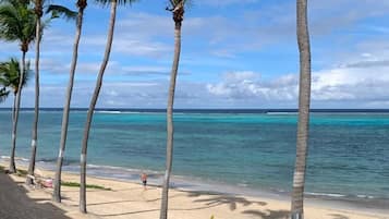 On the beach, sun-loungers, beach towels