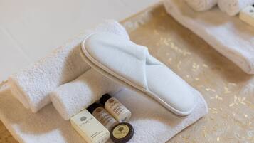 Bathtub, hair dryer, towels, soap