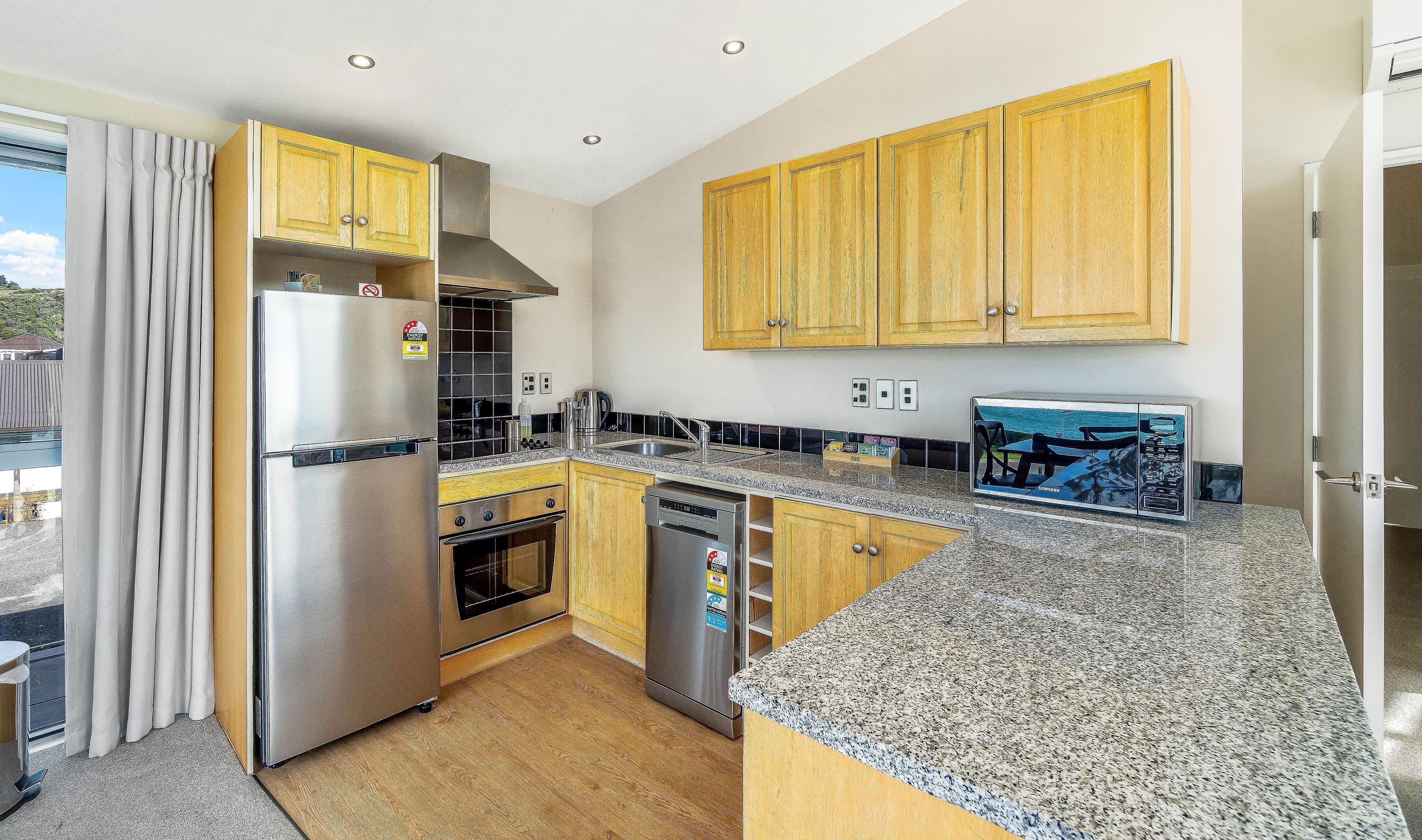 deluxe apartment, 2 bedrooms, ocean view | private kitchen | coffee/tea maker, electric kettle, toaster, high chair