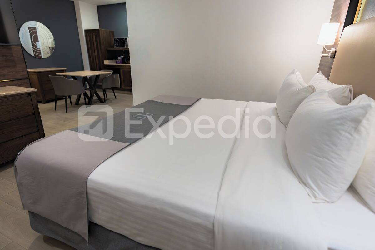 Premium bedding, down duvets, in-room safe, desk