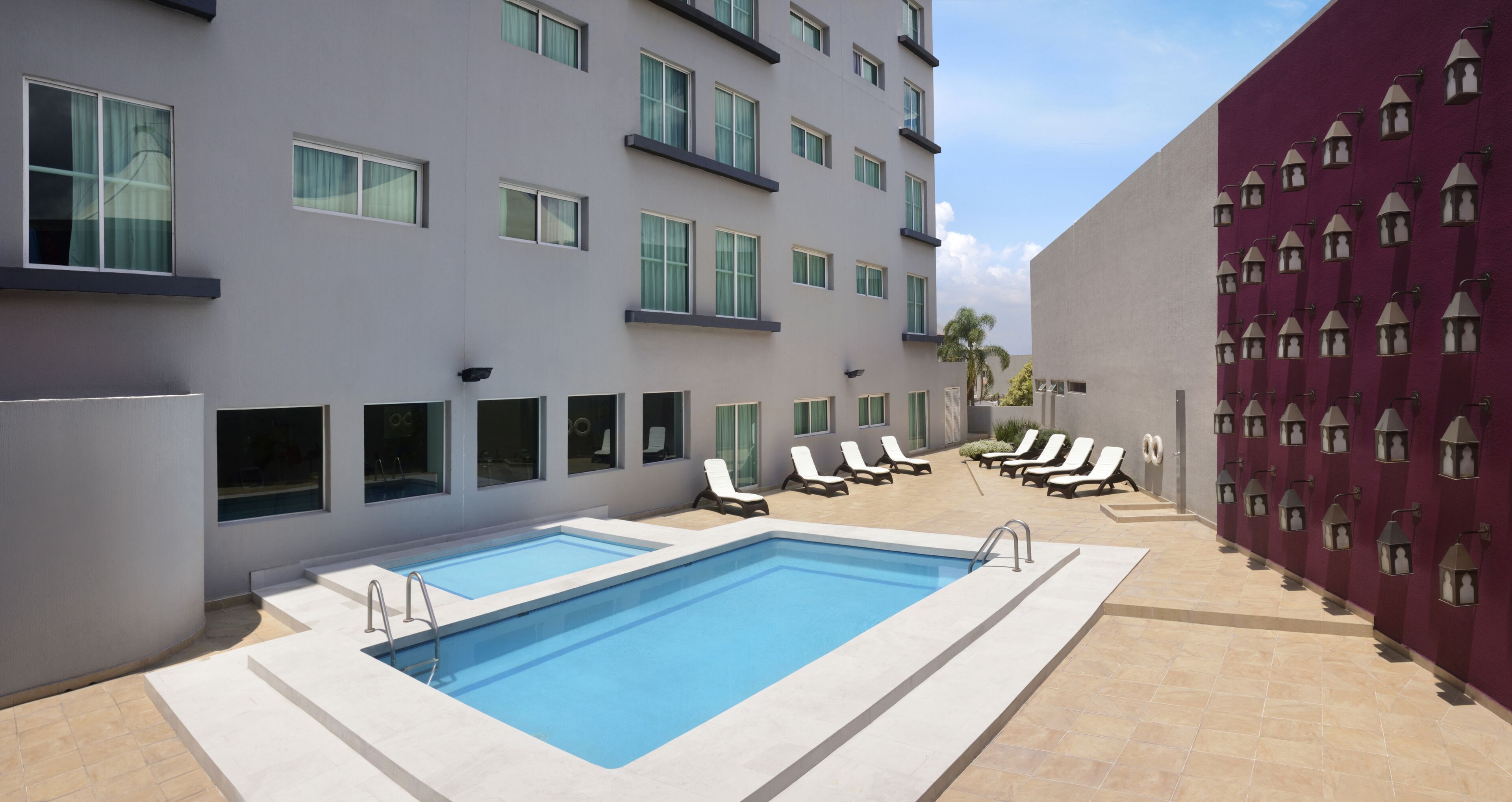 outdoor pool, open 8:00 am to 8:00 pm, pool loungers