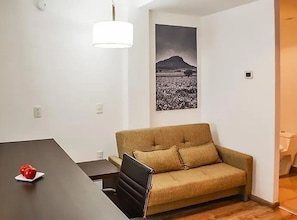 Basic Studio, 1 Bedroom | Living area | 32-inch Smart TV with cable channels, TV - Stain Loft & Suites (Irapuato)