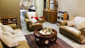 64-inch LCD TV with cable channels, TV, Netflix