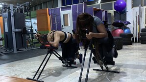A gym with exercise equipment and a wooden floor. - Blue Springs Hotel (Abuja)