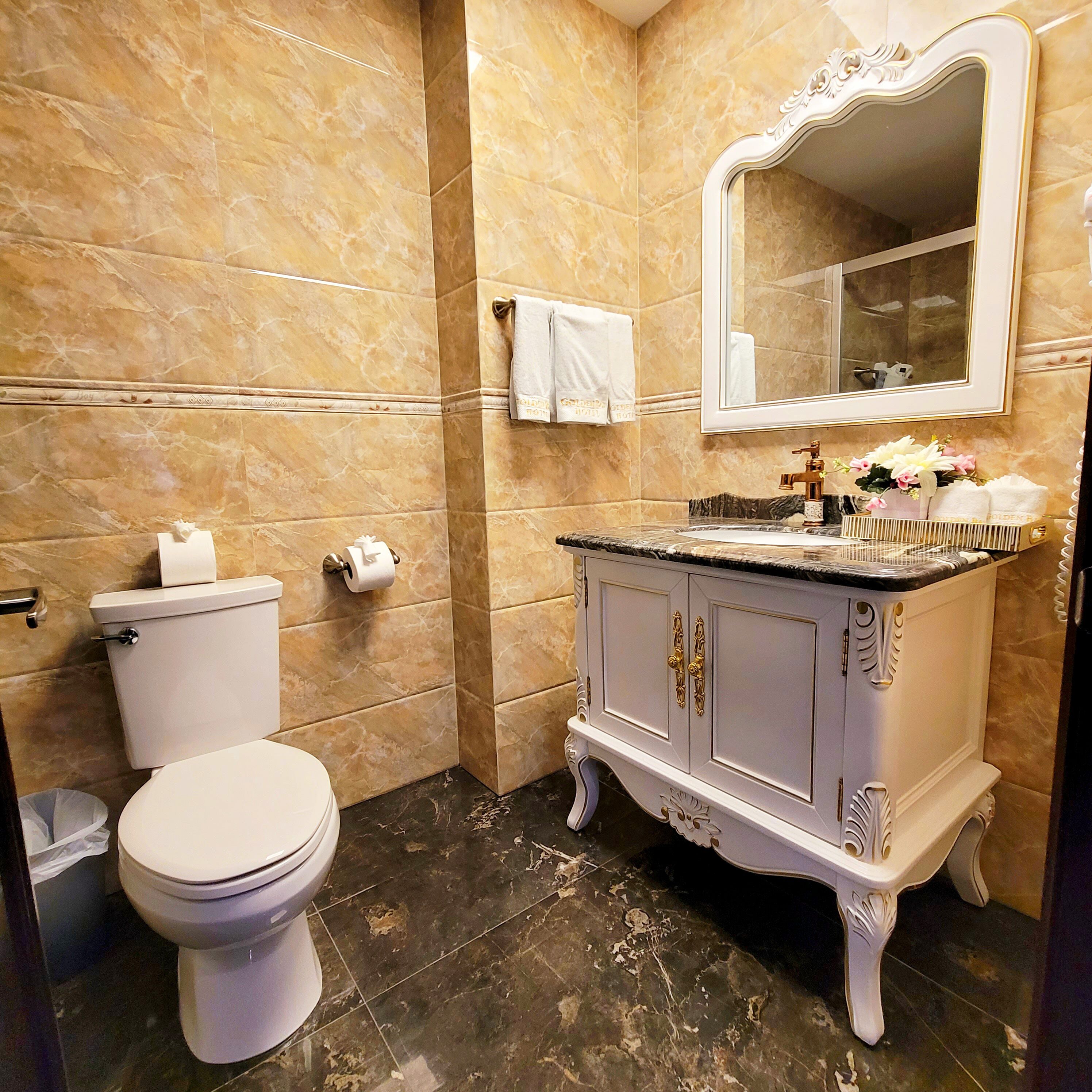 luxury suite, multiple beds, ocean view (jacuzzi) | bathroom | free toiletries, hair dryer, towels, soap