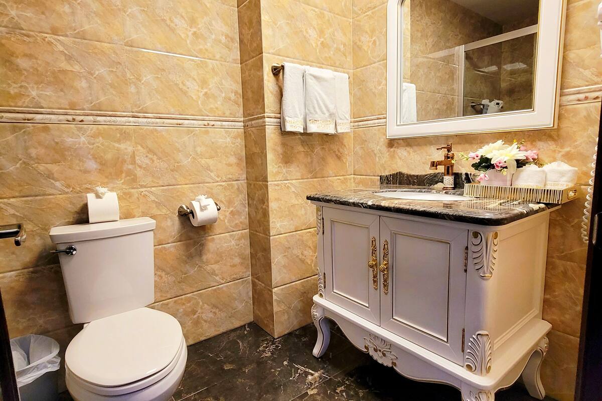 luxury suite, multiple beds, ocean view (jacuzzi) | bathroom | free toiletries, hair dryer, towels, soap