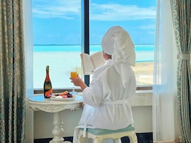 Ropa de cama de alta calidad y minibar