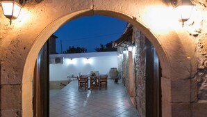Front of property - evening/night - Afroditi's House  Relax in Crete (Mylopotamos)
