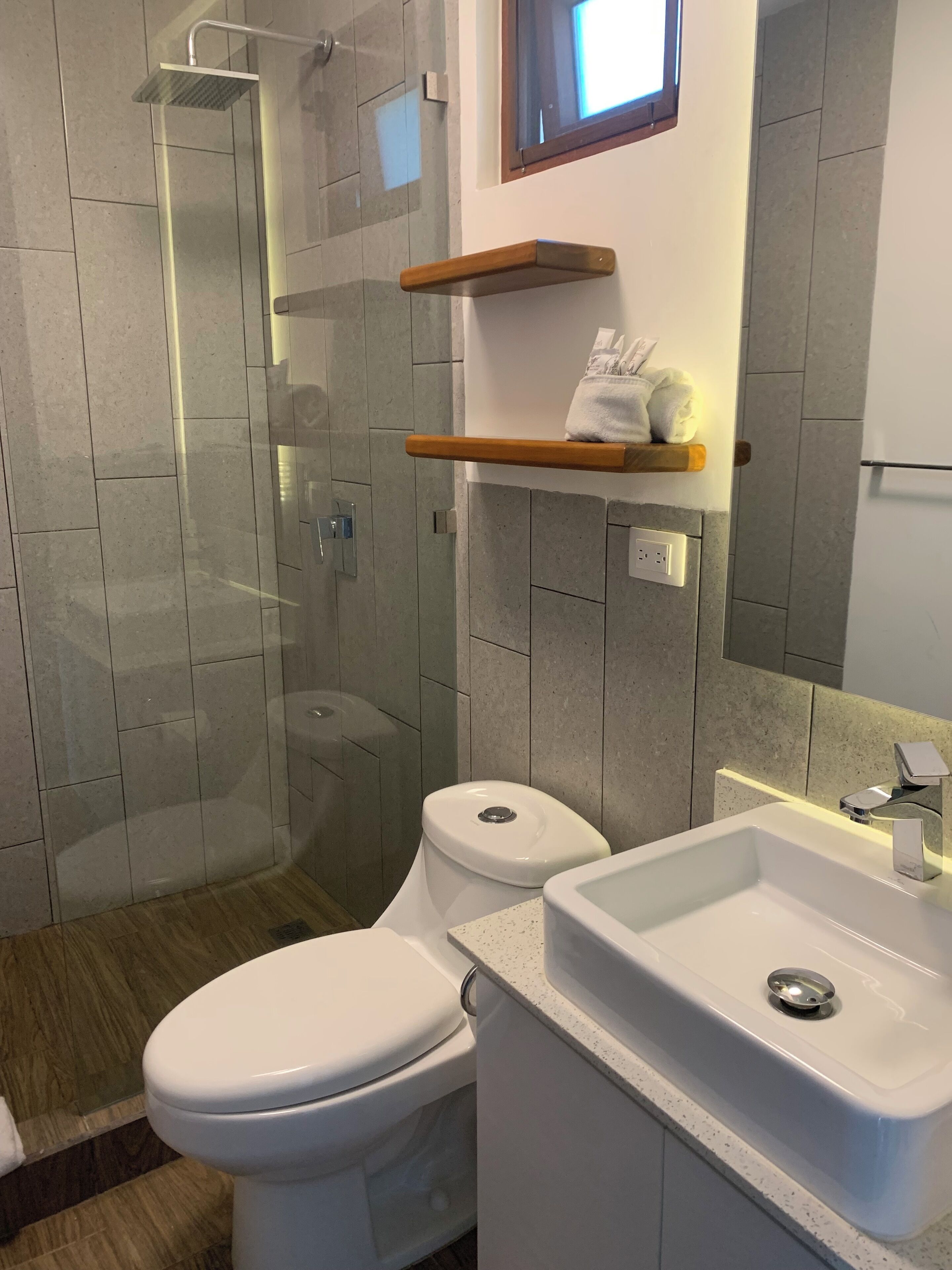 shower, rainfall showerhead, designer toiletries, hair dryer