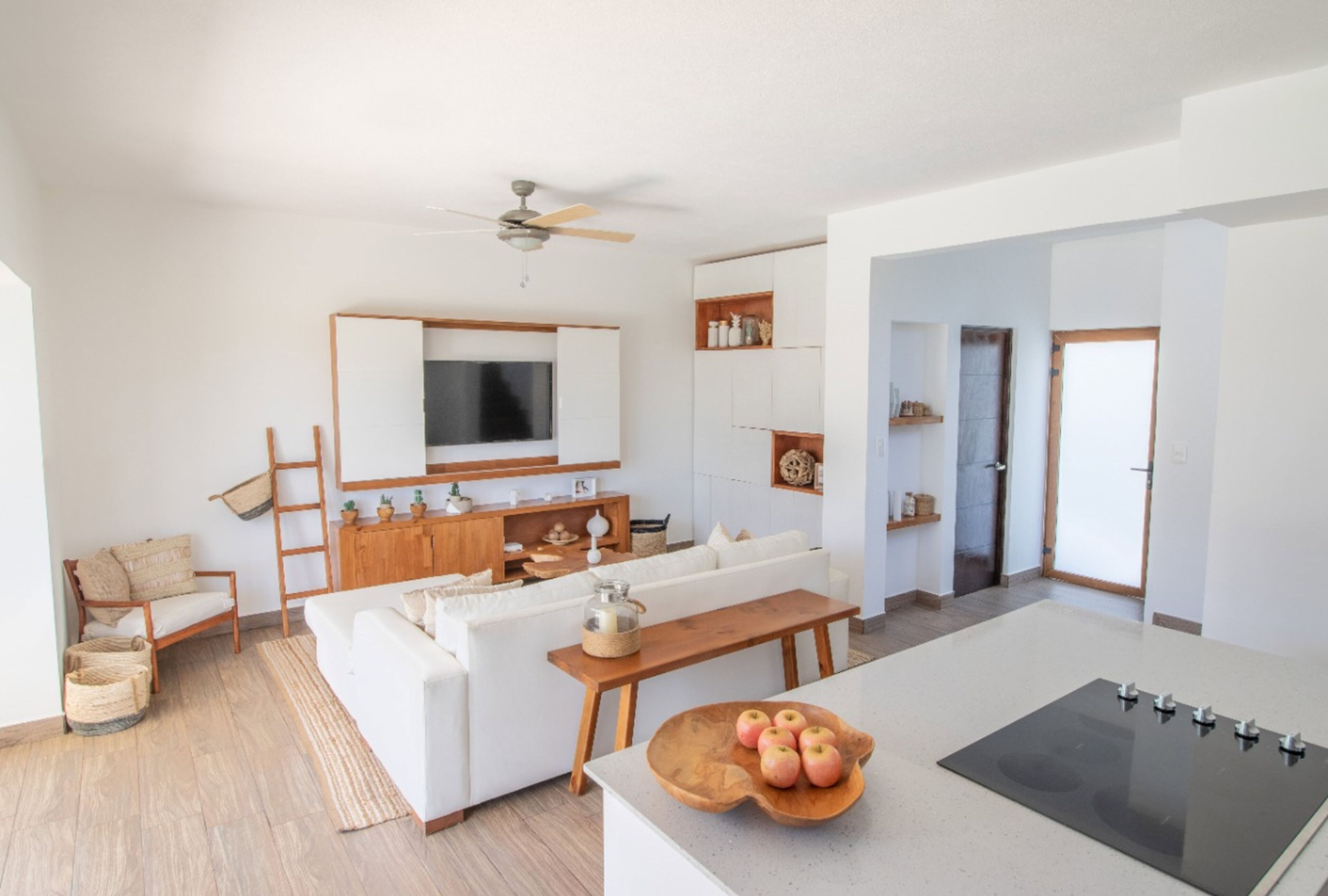 full-sized fridge, microwave, stovetop, coffee/tea maker