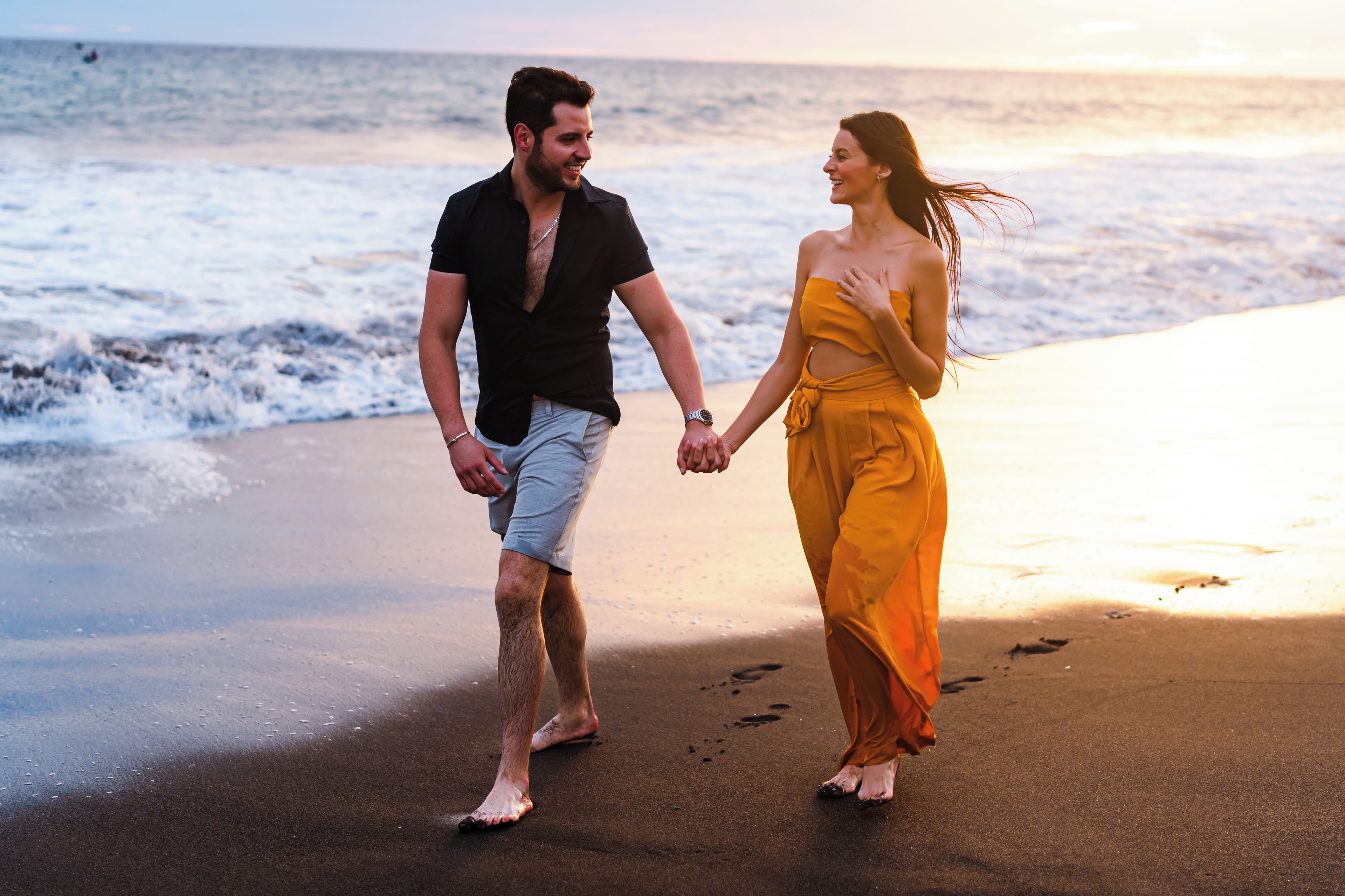 Private beach, black sand, beach towels, beach volleyball