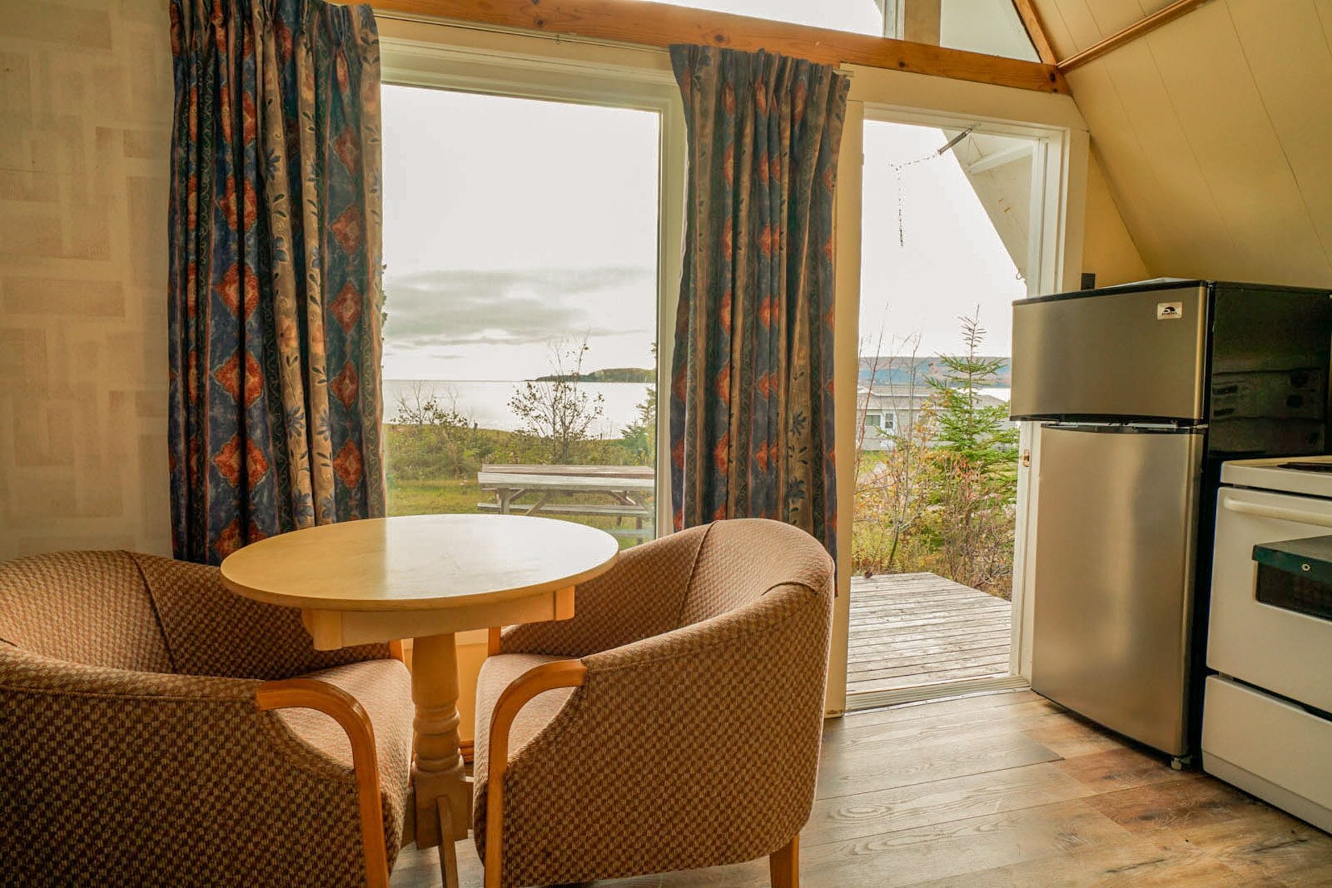 Romantic Cabin | Living area | 32-inch LCD TV with satellite channels, TV