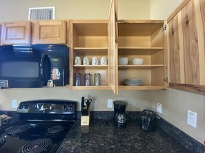 Fridge, stovetop, coffee/tea maker, toaster