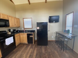 Fridge, stovetop, coffee/tea maker, toaster