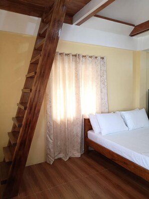 Premium bedding, memory-foam beds, laptop workspace, bed sheets