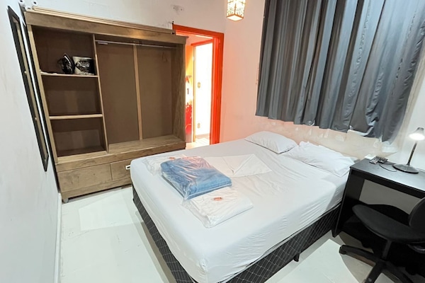 Standard Quadruple Room, 1 Bedroom | Individually decorated, blackout drapes, iron/ironing board, free WiFi