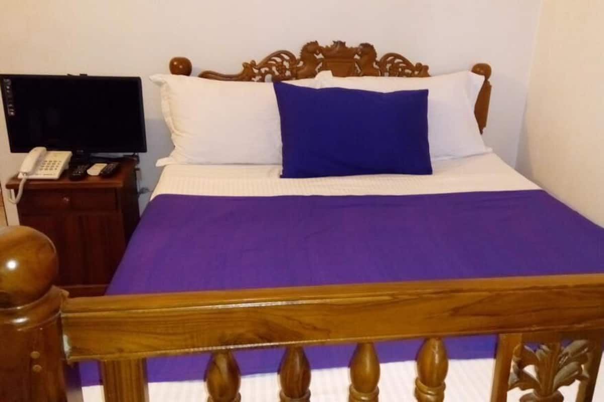 Chambre Deluxe | Lit avec matelas Select Comfort