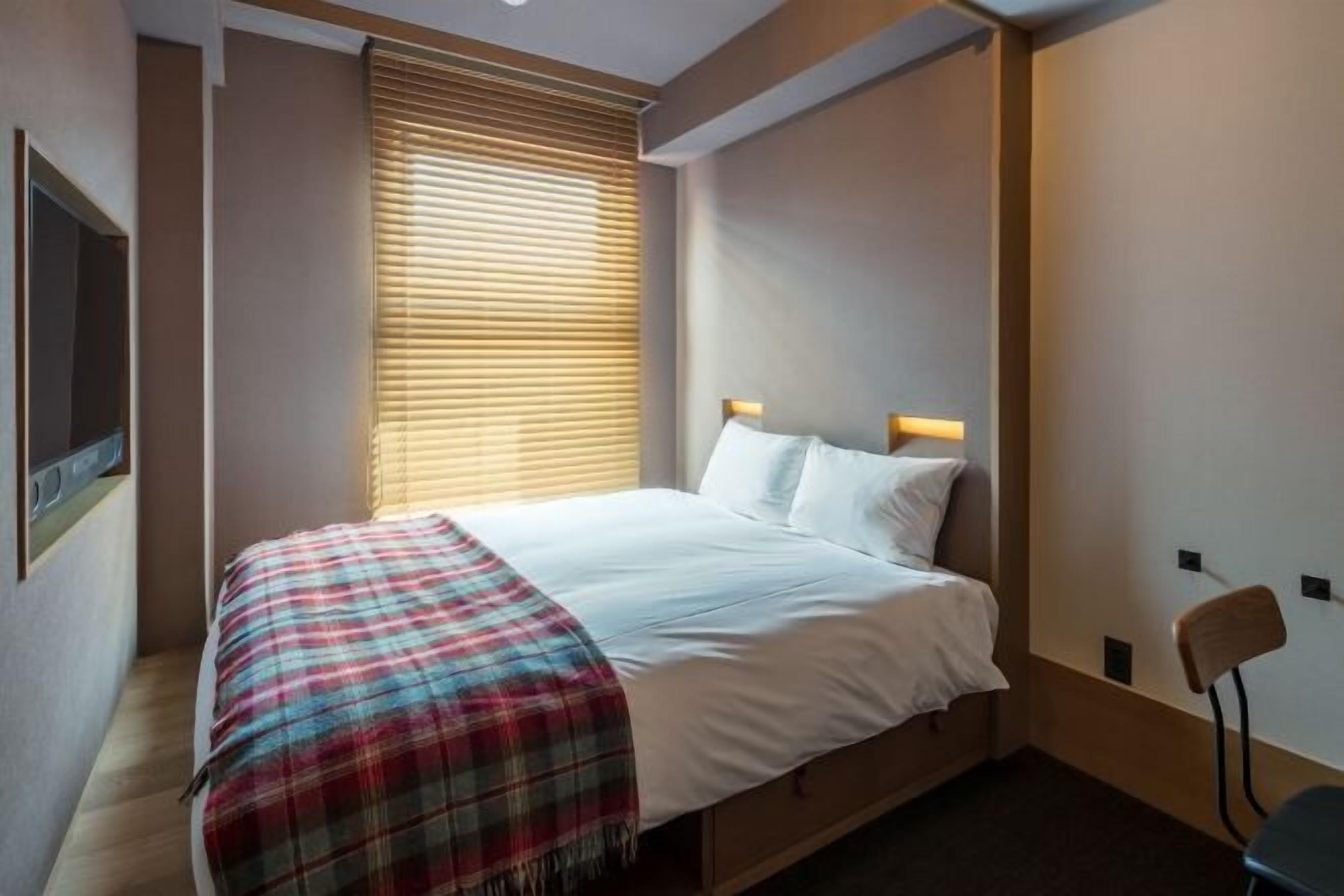 Premium bedding, down comforters, pillowtop beds, in-room safe