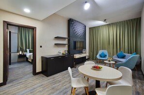 Executive Suite King | Living area | 45-inch flat-screen TV with satellite channels, TV - TIME Express Hotel Al Khan (Sharjah)