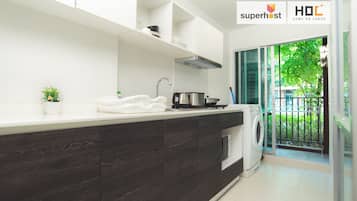 Luxury Condo, Pool View | Private kitchen | Full-size fridge, microwave, stovetop, electric kettle