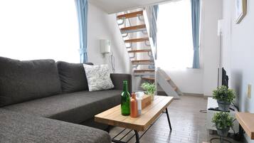 2 Bedrooms Apartment | Living area | Flat-screen TV