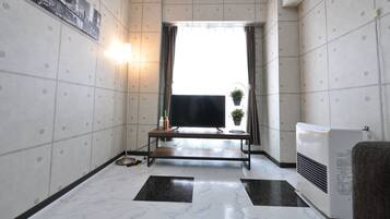 2 Bedrooms Apartment | Living area | Flat-screen TV