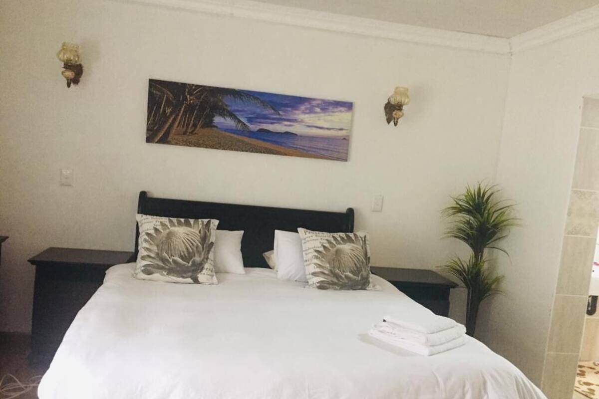 Casa de ciudad confort | Tabla de planchar con plancha, wifi gratis y ropa de cama