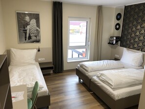 Triple Room | Bathroom | Shower, hair dryer, towels, soap