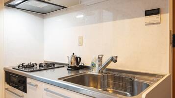 Mini-fridge, microwave, stovetop, electric kettle