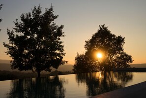 Seasonal outdoor pool, pool loungers