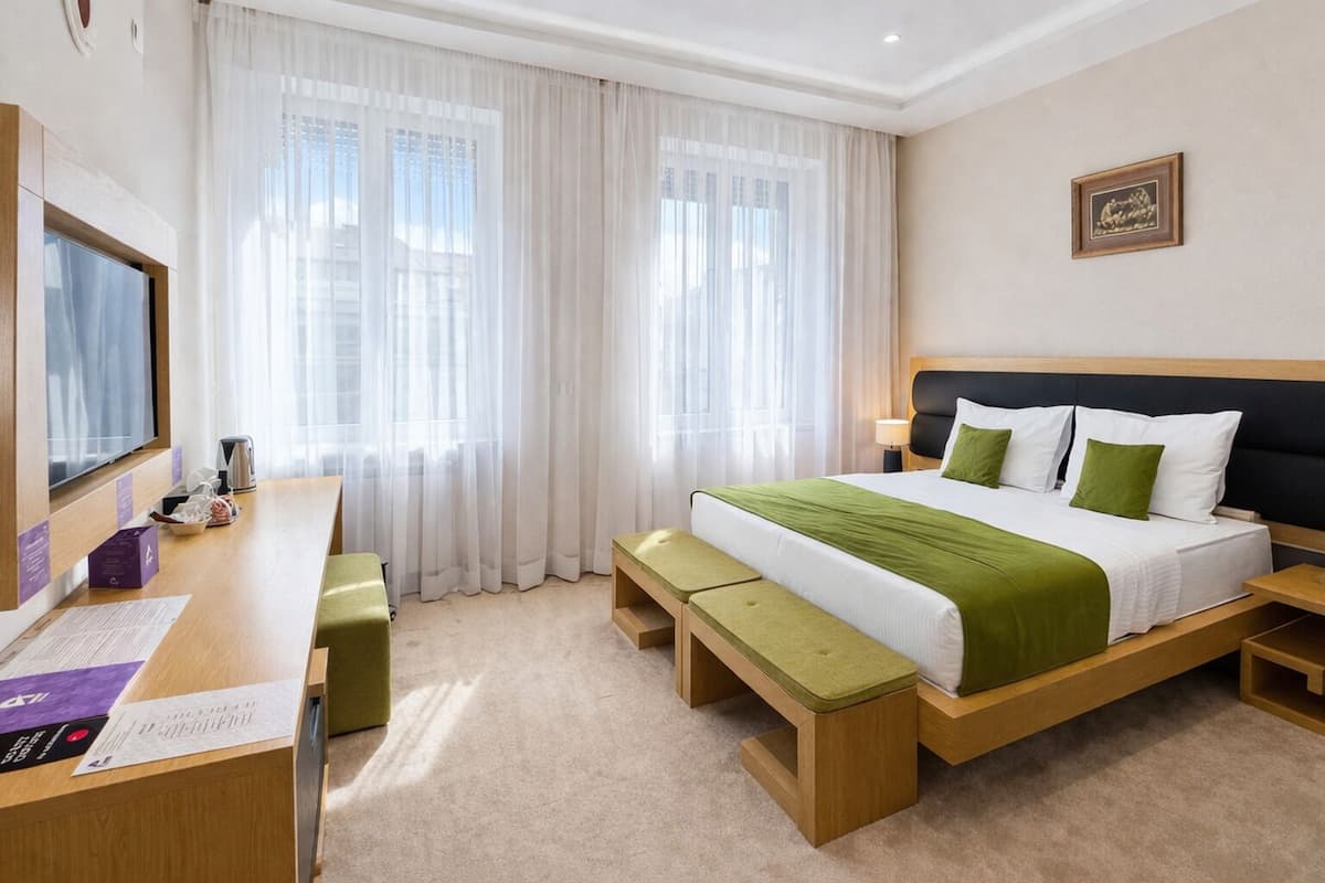 Quarto casal ou duplo superior | Banheiro | Produtos de toalete grátis, secador de cabelo, roupões de banho