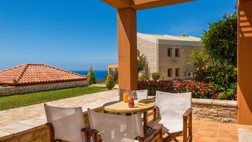 Villa, 2 Bedrooms, Sea View, Poolside | Terrace/patio
