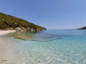 På stranden och strandhanddukar