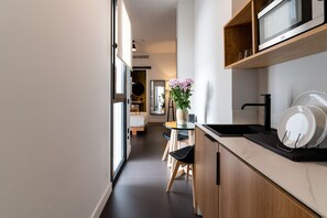 Premium Room | Premium bedding, down comforters, in-room safe, blackout drapes - Welldone Quality - Crystal Pool (Seville)