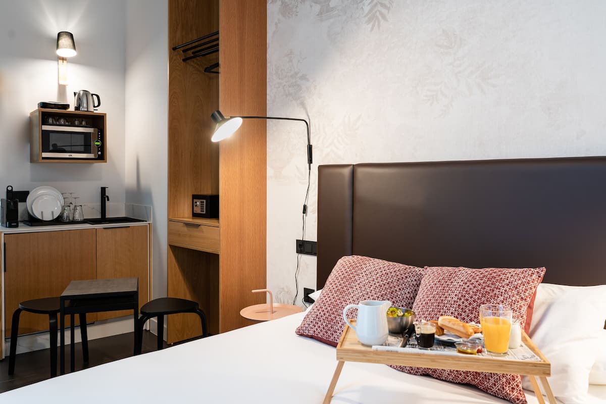 Habitación superior | Ropa de cama de alta calidad y edredón