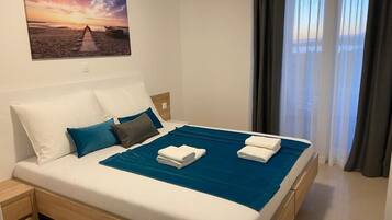 Deluxe Apartment, 1 Queen Bed with Sofa bed, Non Smoking, Terrace | In-room safe, iron/ironing board, free WiFi, bed sheets