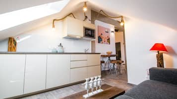 Design Loft | Private kitchen | Mini-fridge, electric kettle, high chair, cookware/dishes/utensils