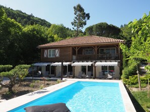Seasonal outdoor pool, a heated pool, sun loungers