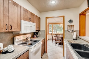 Condo, 2 Bedrooms | Private kitchen | Fridge, microwave, dishwasher, coffee/tea maker