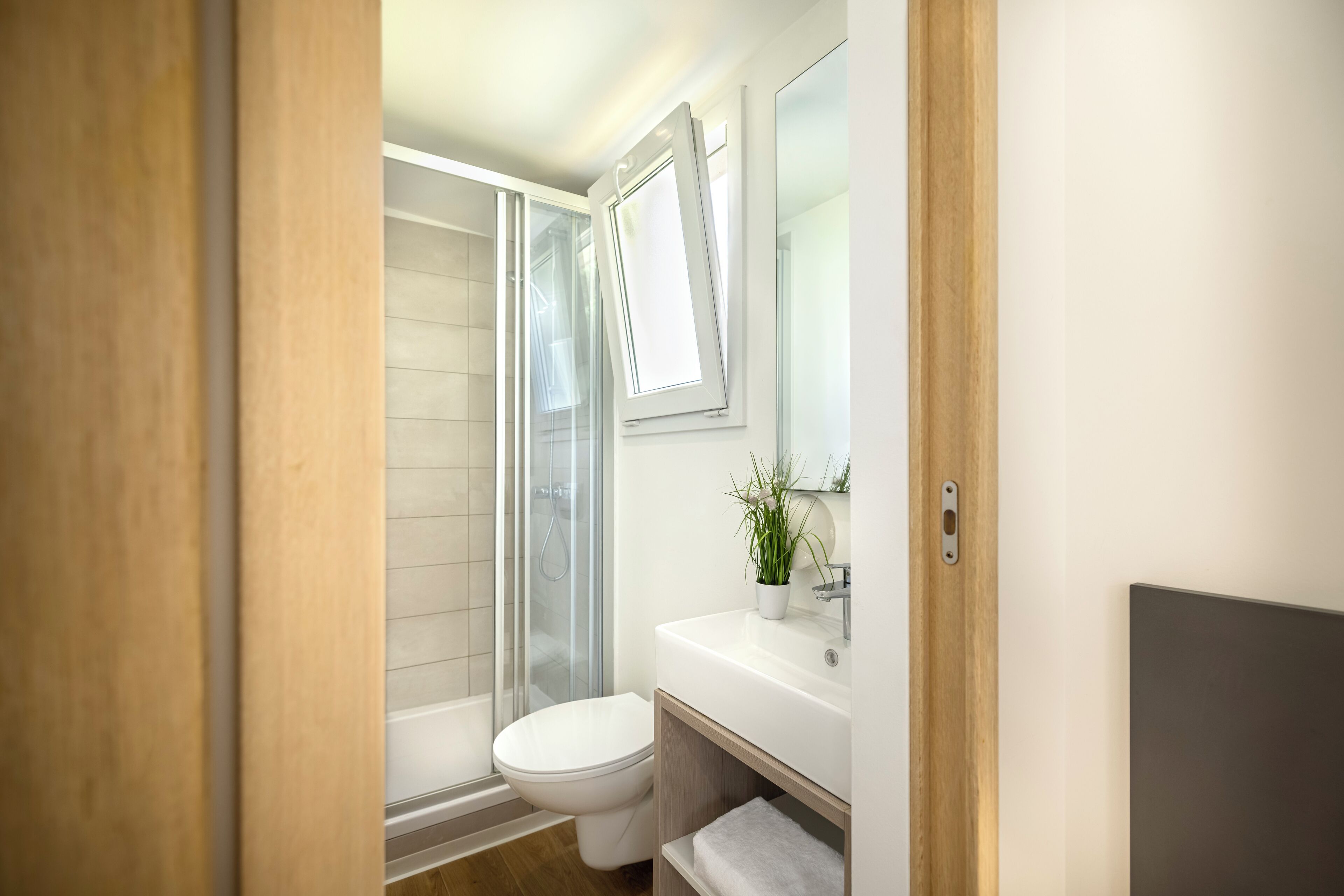 Standard Mobile Home | Bathroom | Shower, hair dryer, towels, soap