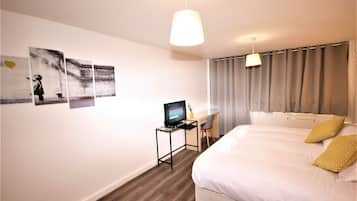 Individually furnished, desk, laptop workspace, blackout curtains