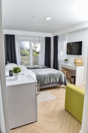 Ropa de cama de alta calidad, minibar y sistema de insonorización