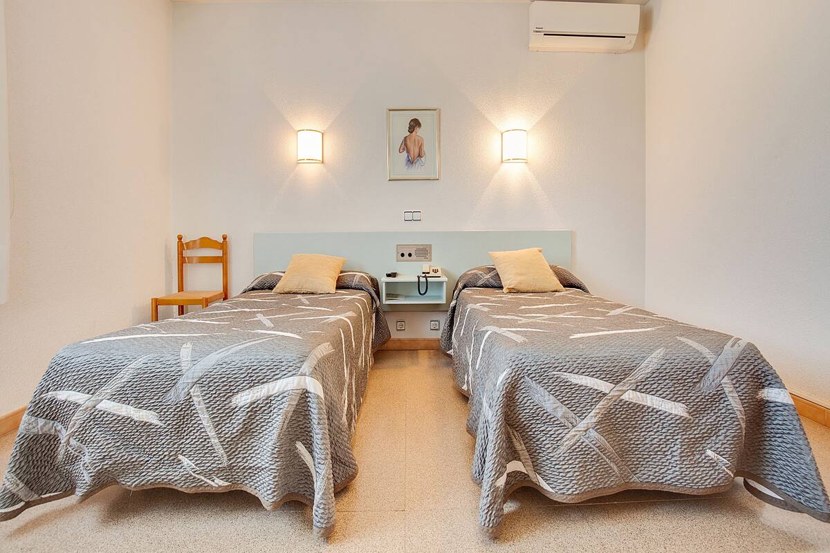 Wi-Fi de cortesia, roupa de cama