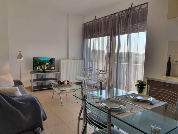 Apartment, 1 Schlafzimmer | Wohnbereich | Flachbildfernseher