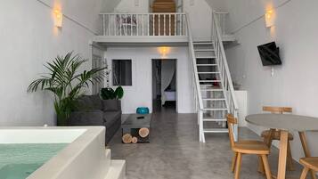 32-inch flat-screen TV with cable channels, Smart TV