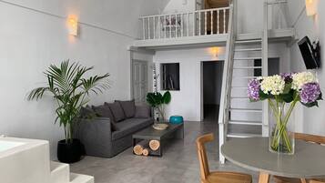 Deluxe Villa, 2 Bedrooms, Jetted Tub, Sea View | Living room | 32-inch flat-screen TV with cable channels, Smart TV